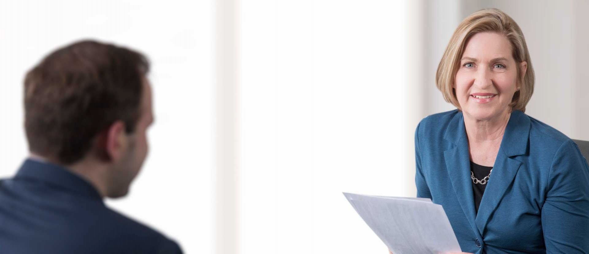 Woman Reading Paper